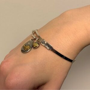 Brighton peace on earth bangle with two stretch bracelets